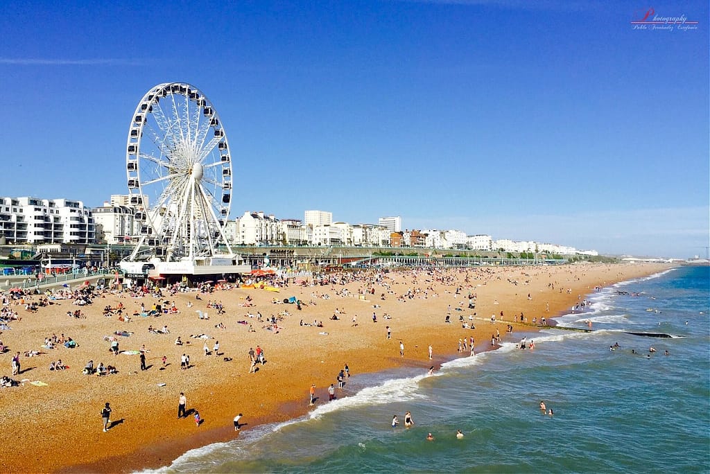 Brighton seafront and beach with Ferris wheel, a popular landmark near rental properties in Brighton & Hove